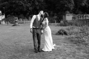 bride groom kissing