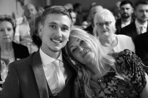 groom with mother before his wedding