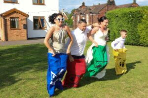 sack race at garden wedding