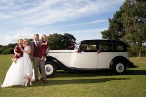 bride and groom with family at woodland waters