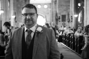groom waits for bride prior to ceremony