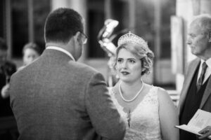 bride and groom exchange vows