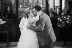 bride and groom shar efirst kiss