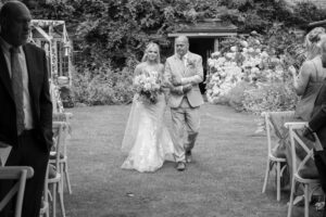 bride with father at doddington hall