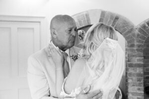 father sees his daughter bride for first time at doddington hall