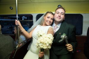 bride and friend on London bus